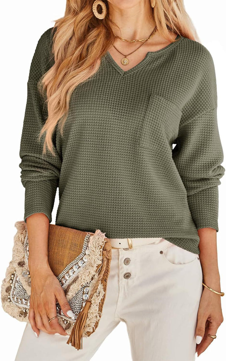 Women's sweater in textured waffle weave with deep V-neck and practical pockets Lune London