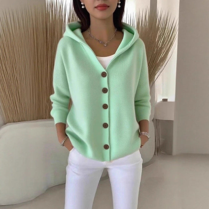 Knitted hooded jacket for ladies with practical button details and a relaxed fit Lune London