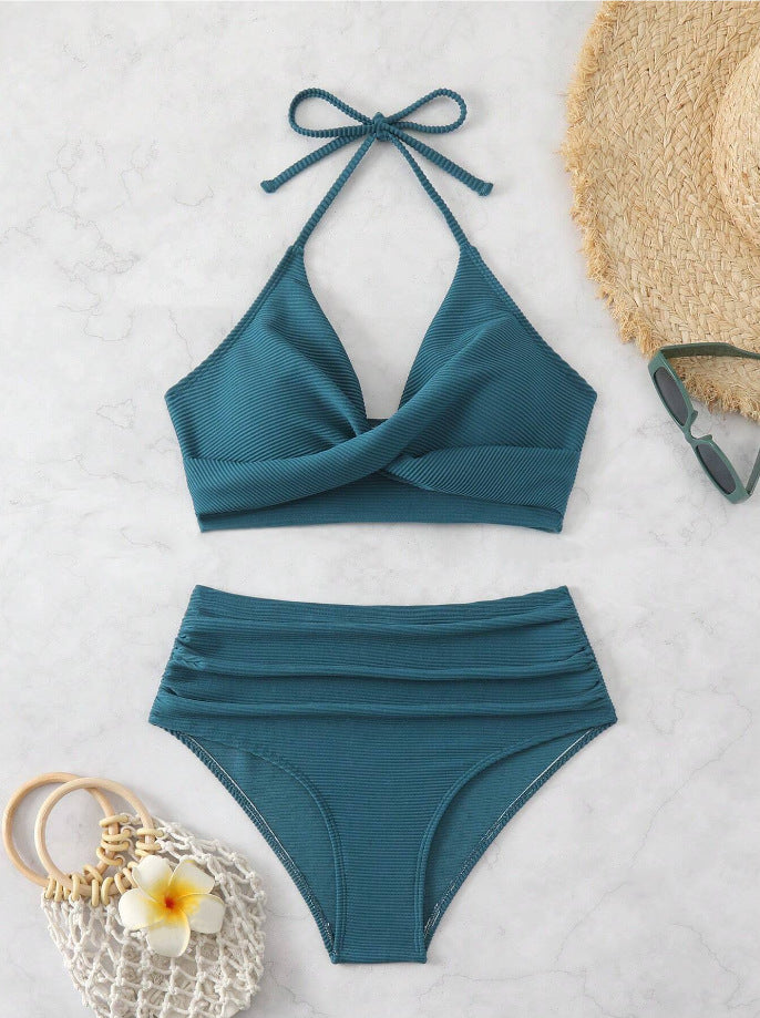 High-waisted women's bikini with an elegant draped top and a playful design Lune London
