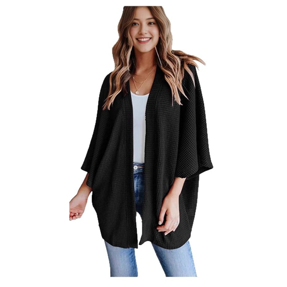 Ladies casual knit kimono with a loose fit and chic casual design
