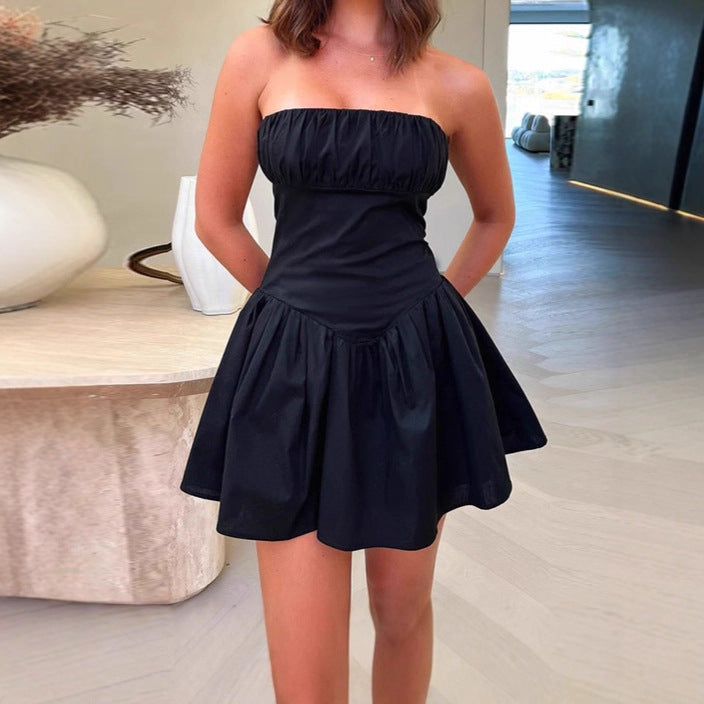 Minimalist strapless dress for women with a voluminous ruffled hem and an elegant cut Lune London