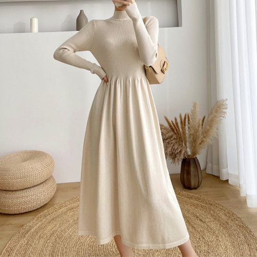 Robe midi élégante pour femmes avec taille élastique et manches longues Chic & Stil