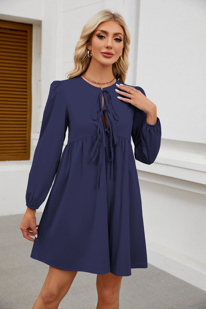 Fitted dress for women with knot opening and balloon sleeves Lune London