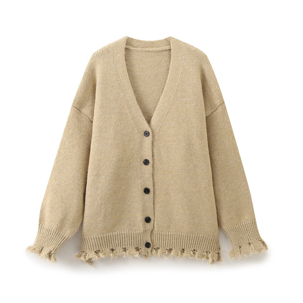 Casual knitted jacket for women with fringed hem and button closure Lune London