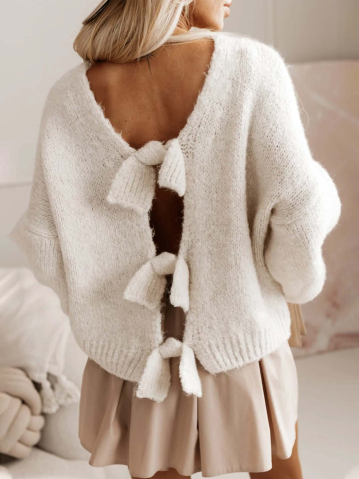 Casual knitted sweater for women with deep cut in the back and bow details Lune London