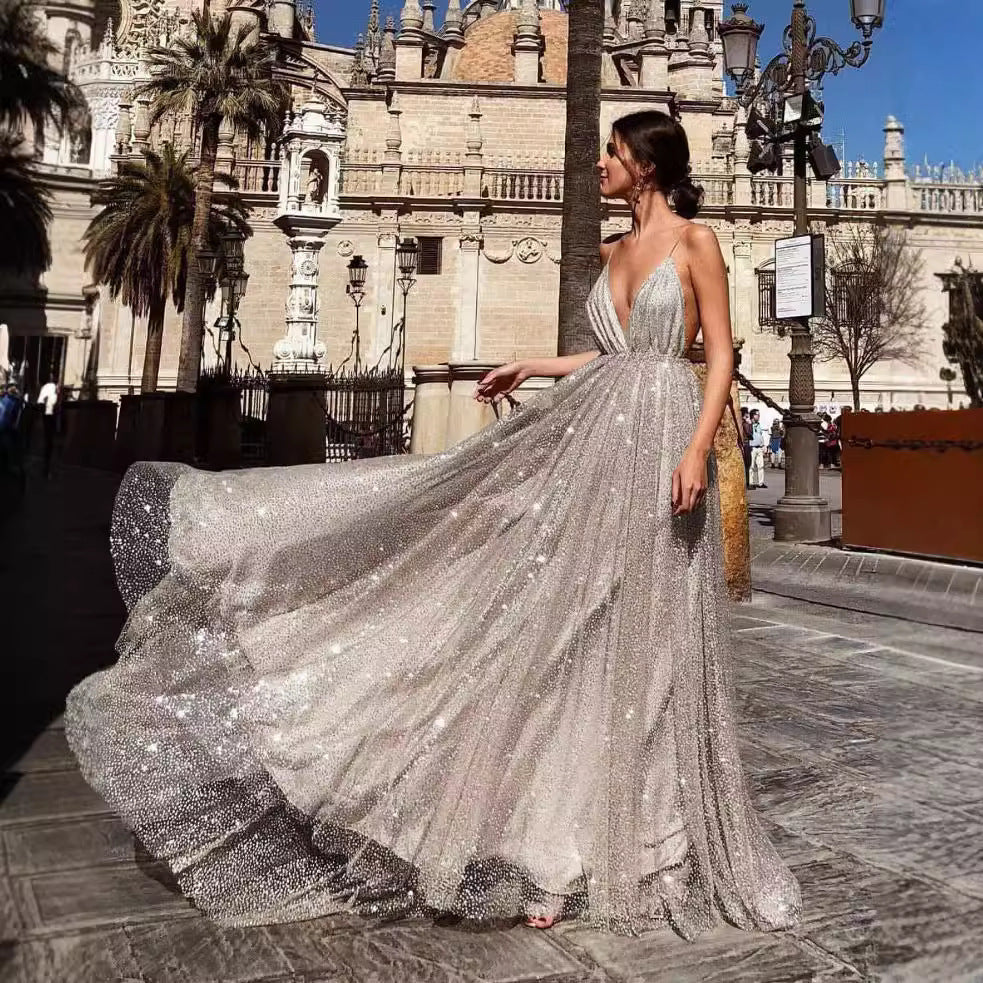 Ladies Glamorous Evening Dress with Deep V-Neck and Shining Sequins Lune London