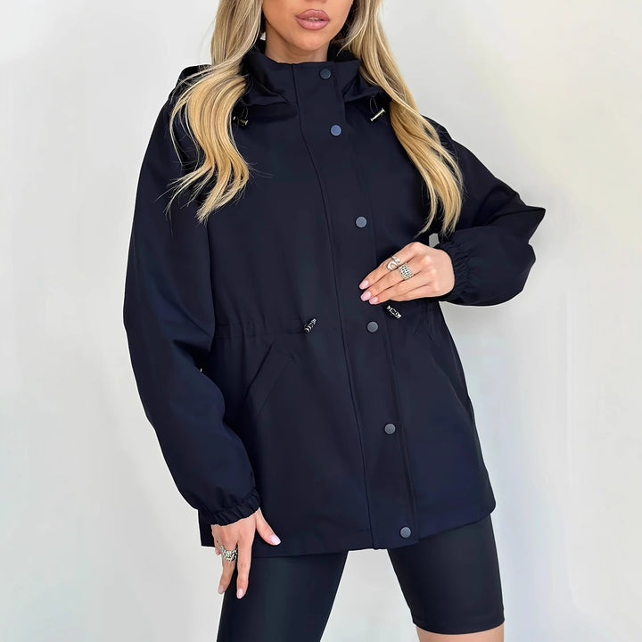 Women's waterproof leisure jacket with adjustable hood and elastic waist Lune London