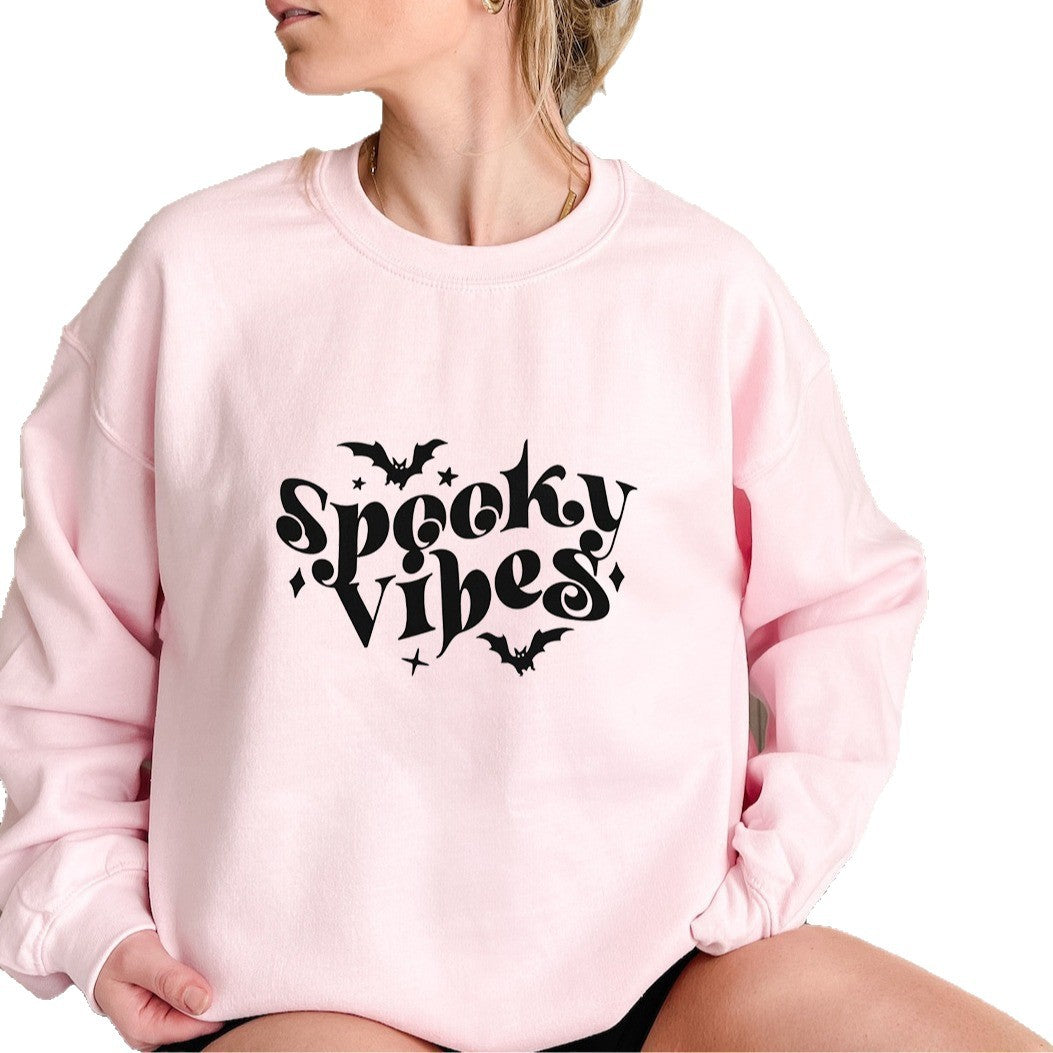 Sweat à capuche pour femmes avec un design Halloween ludique et une coupe confortable Chic & Stil
