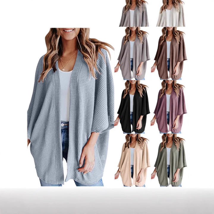 Ladies casual knit kimono with a loose fit and chic casual design