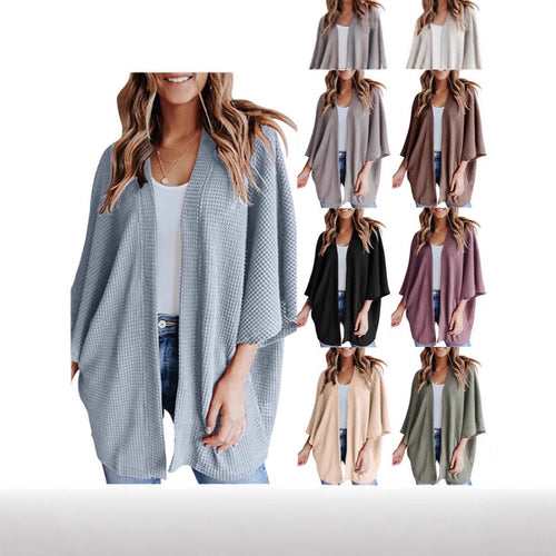 Ladies casual knit kimono with a loose fit and chic casual design