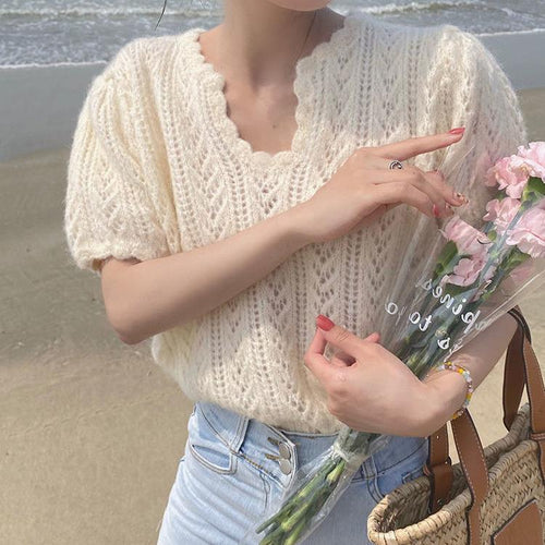 Knitted sweater for women with a feminine openwork pattern Lune London