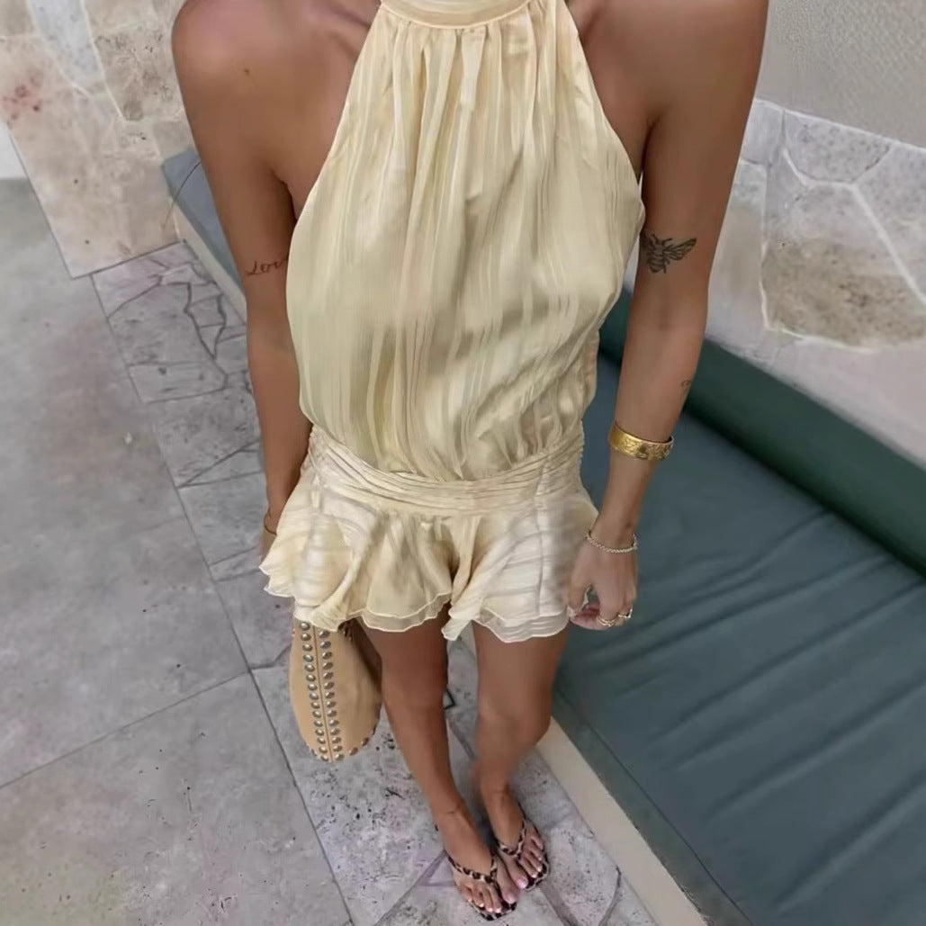Lady Top with backless design, ruffled hem, and elastic waist Lune London