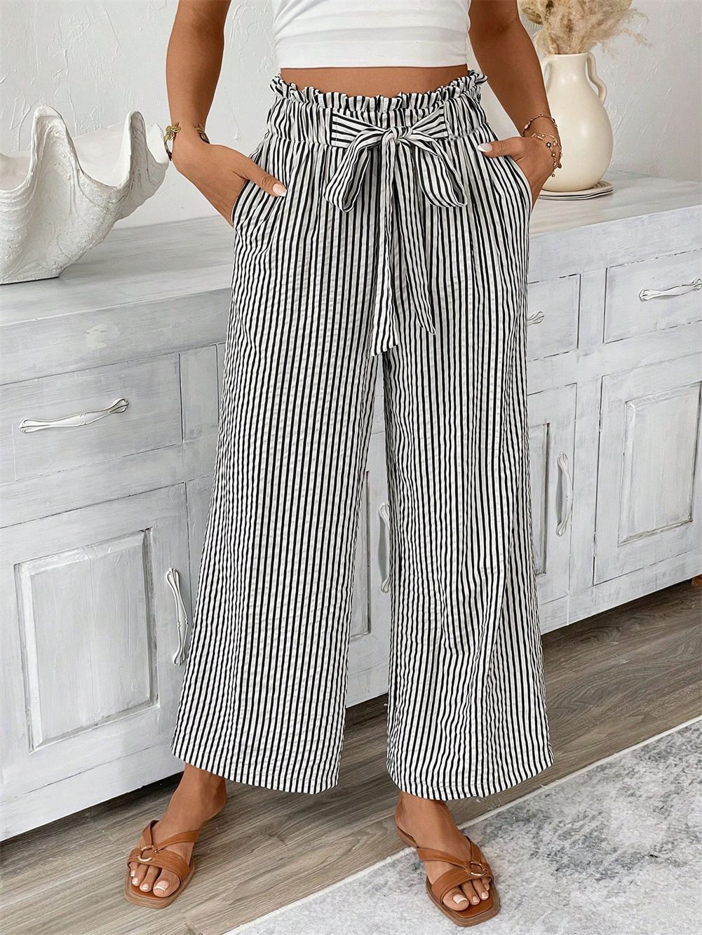Wide striped leisure trousers for women with a tie belt Lune London