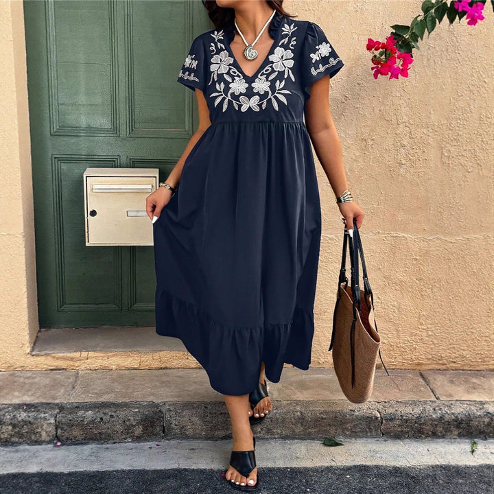 Maxi dress for women with embroidered floral design and voluminous skirt Lune London