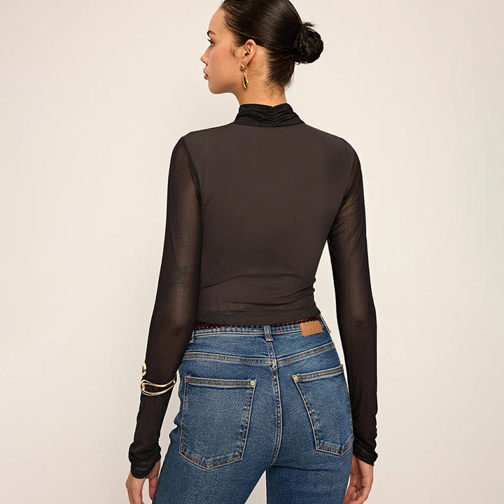 Women Elegant long sleeve top with wrapped design and transparent inserts Lune London