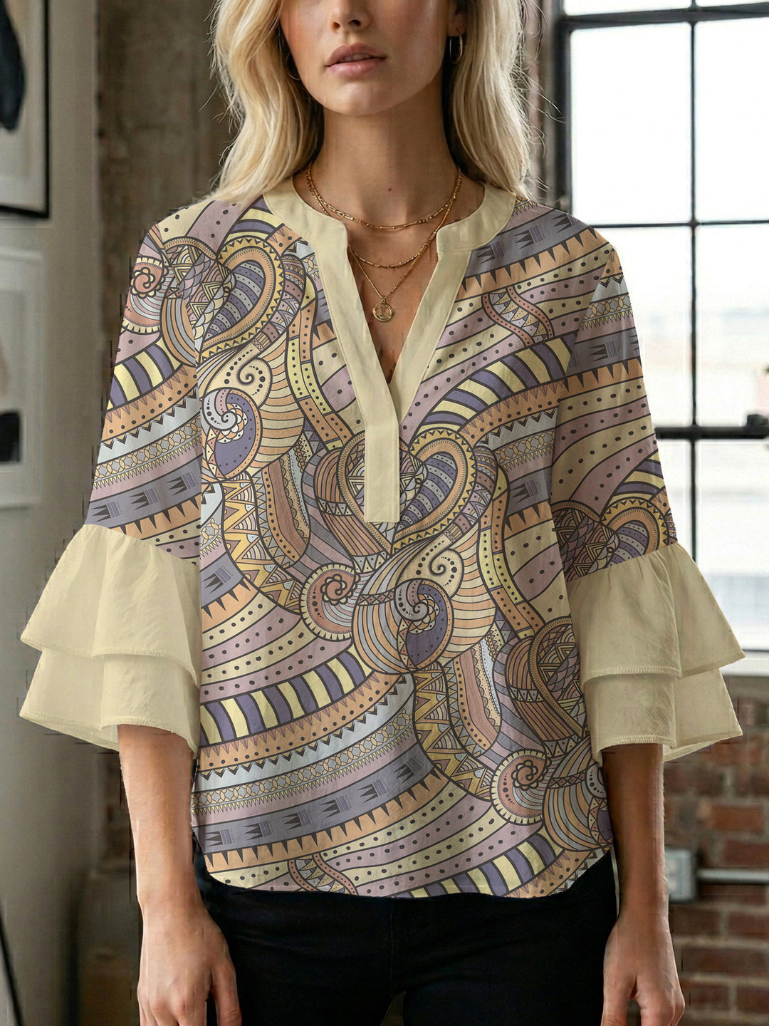 Ladies elegant top with voluminous ruffle hems and floral design Lune London