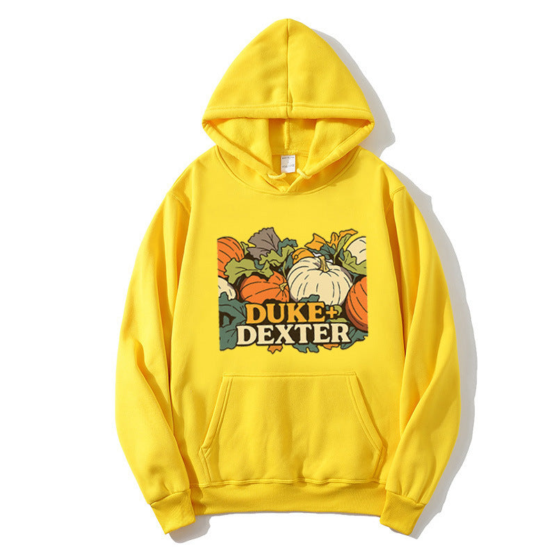 Women's hoodie with cheerful pumpkin motif Chic & Stil