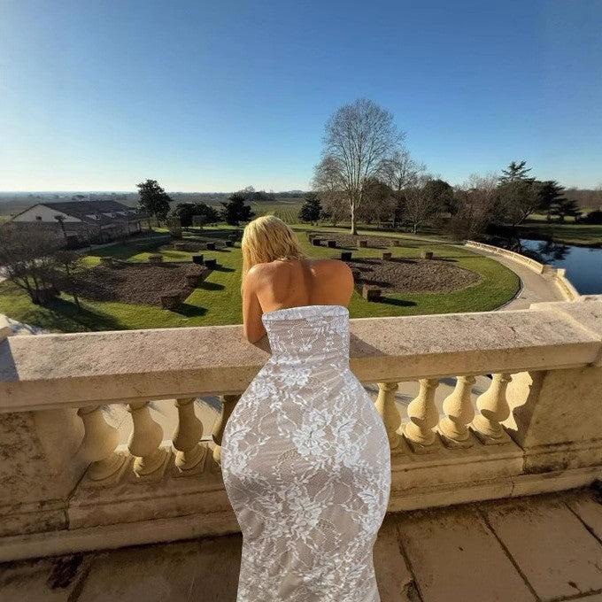 Women's lace dress with figure-flattering design and elegant knot detail Lune London