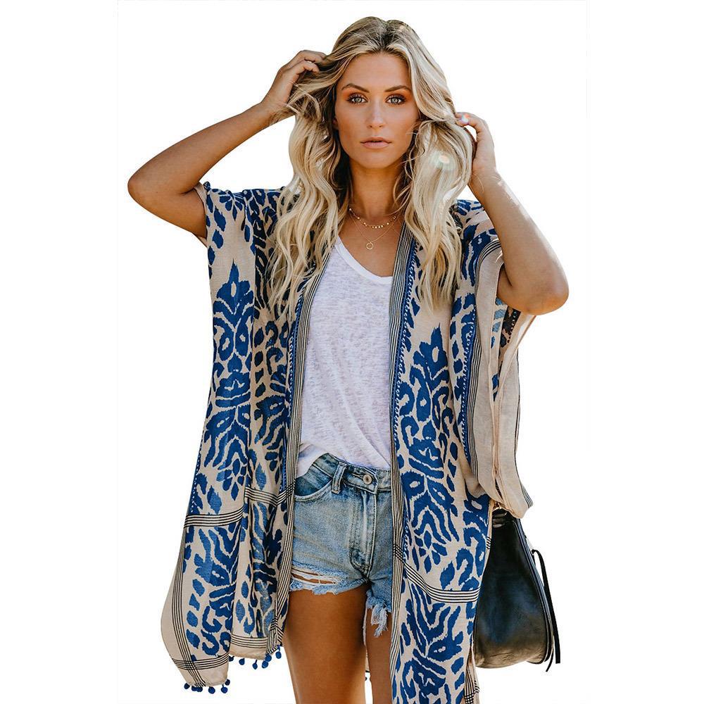 Ladies lightweight kimono cardigan with intricate pattern and fringed hem Lune London