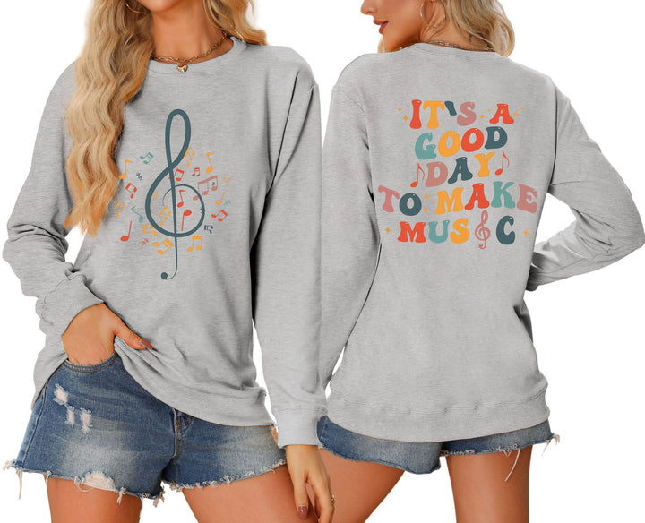 Sweatshirt pour femmes avec motif musical et lettrage créatif Chic & Stil