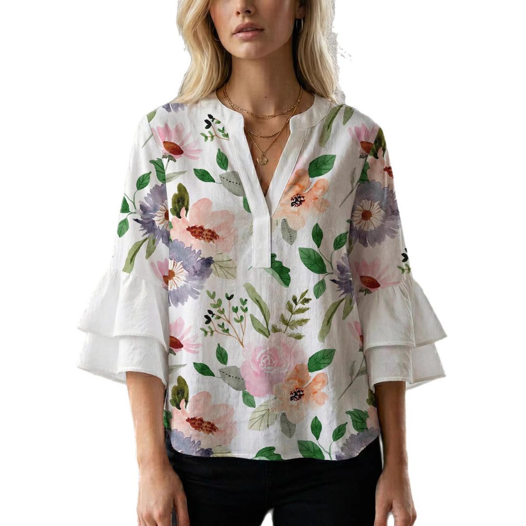 Women's blouse with ruffle details and eye-catching animal print Lune London