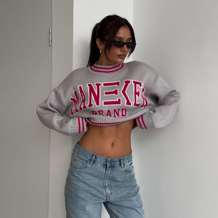 Ladies trendy, casual Crop-Sweater with graphic text and chic sports accents