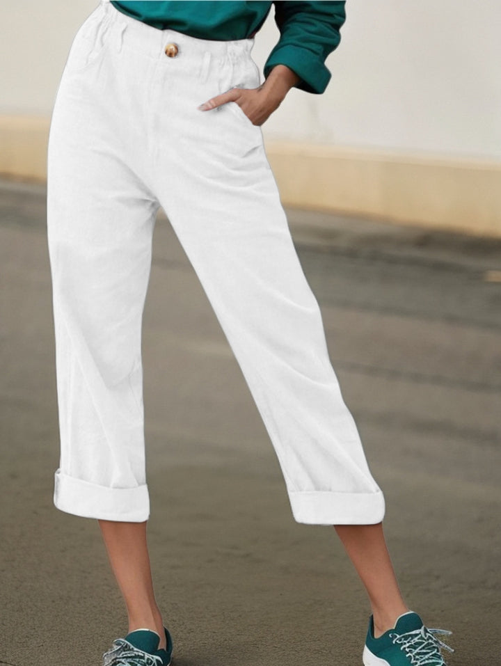 Elegant linen pants for women with wide legs and turned-up hem Lune London