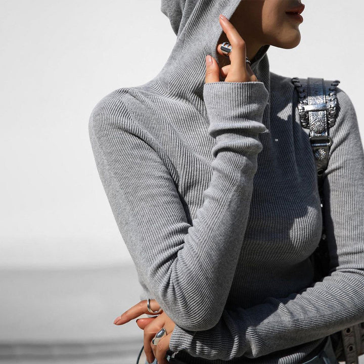 Ladies highly fitted turtleneck with thumb holes and structured design Lune London