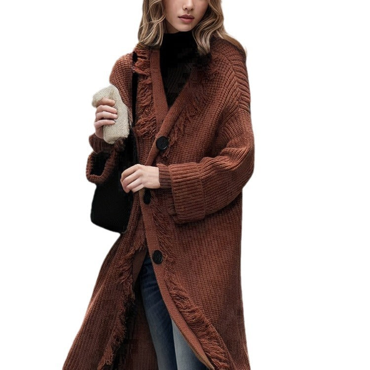 Ladies chunky knitted cardigan with fringed details and an open cut Lune London