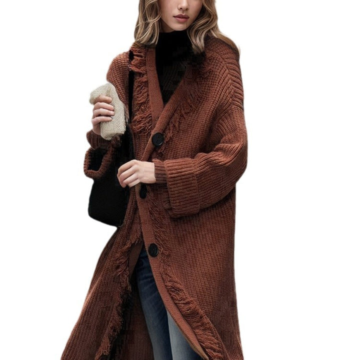 Ladies chunky knitted cardigan with fringed details and an open cut Lune London