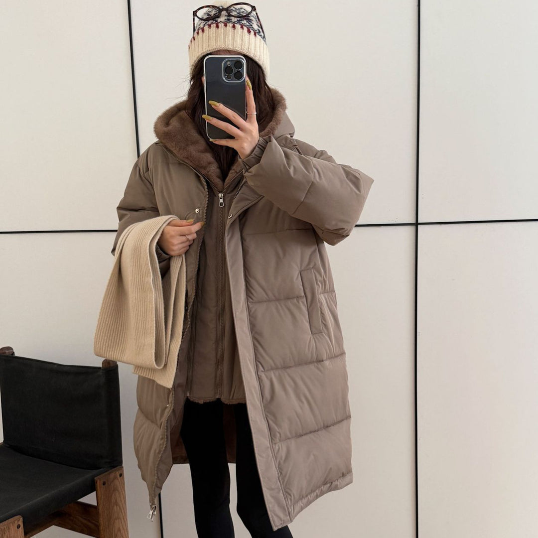 Ladies elegant winter padded parka with faux fur collar and practical pockets Lune London