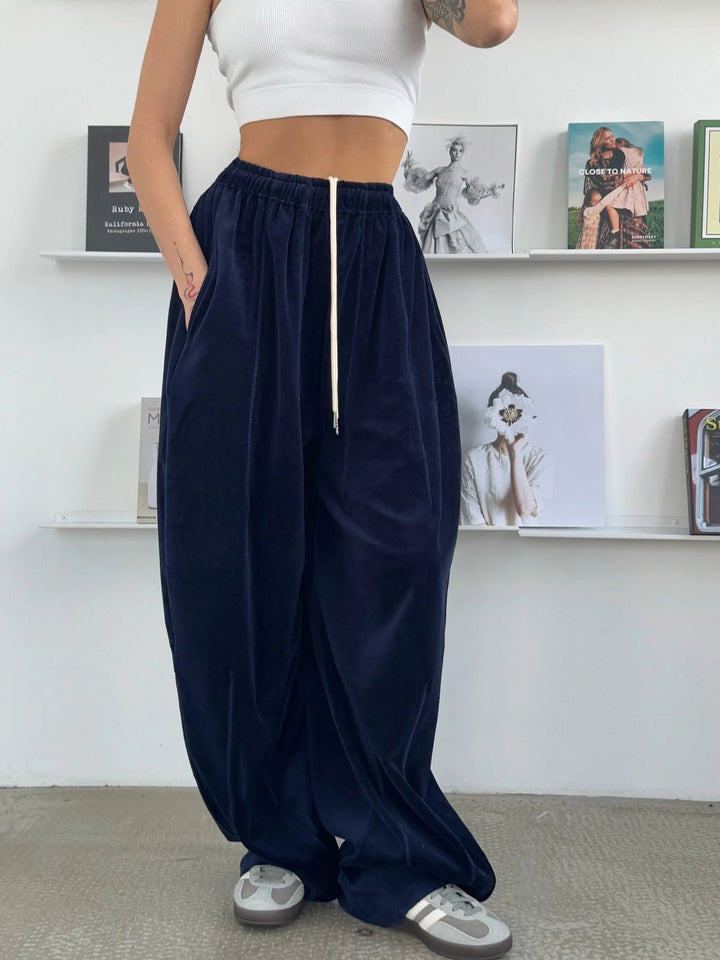 Wide velvet pants for women with elastic waist and practical side pockets Lune London