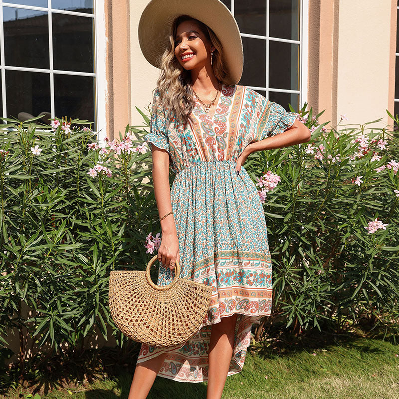 Boho midi dress for women with asymmetrical hem and striking print Lune London