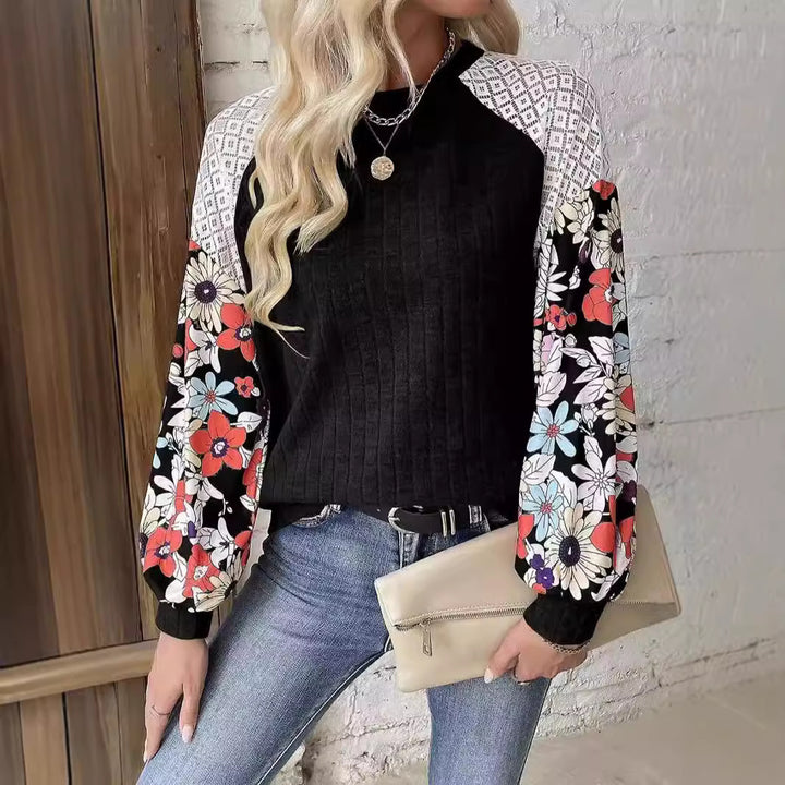 Women's sweater with a playful shape featuring a chic floral sleeve design