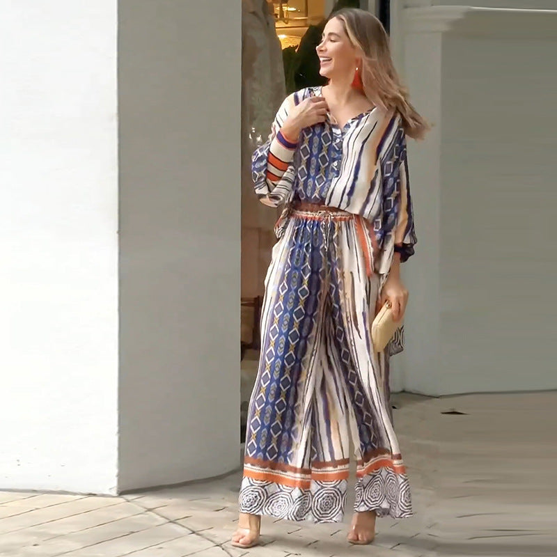 Elegant maxi dress for women with a modern graphic pattern and a fitted bust area Lune London