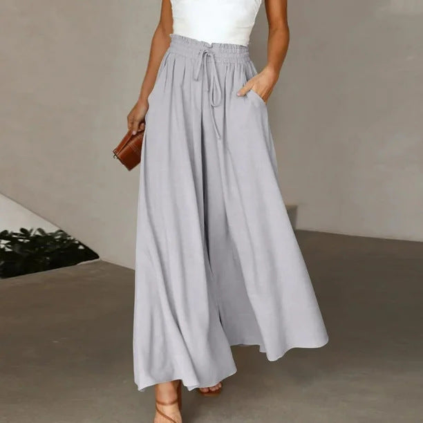 Pantalons Palazzo larges pour femmes avec taille élastique et poches latérales pratiques Chic & Stil