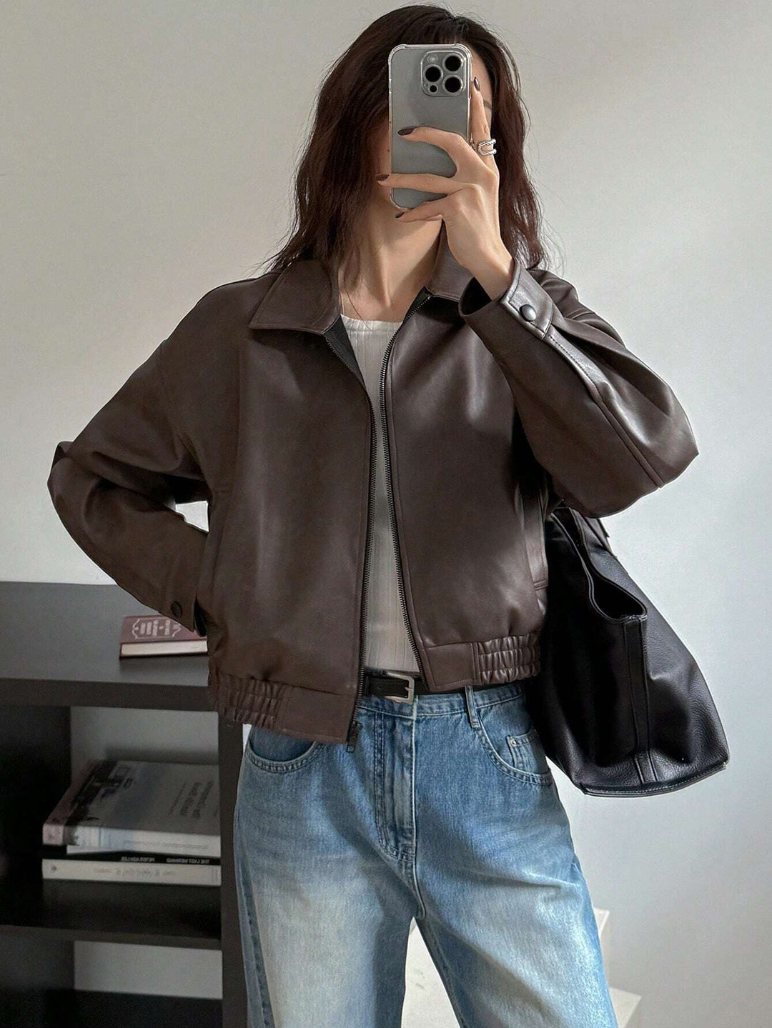 Trendy short coat for women in soft faux leather with elastic straps Lune London