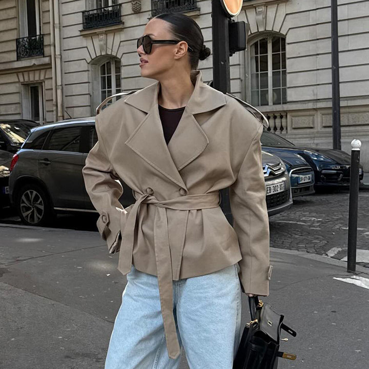 Elegant trench coat for women with fitted belt and bare shoulders Lune London