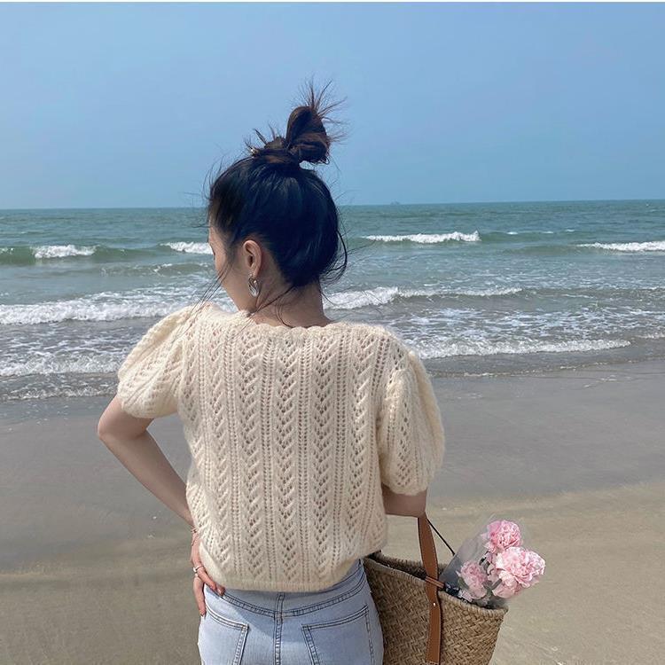 Knitted sweater for women with a feminine openwork pattern Lune London