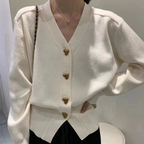 Ladies Elegant Knit Vest with Decorative Button Details and Chic V Neck