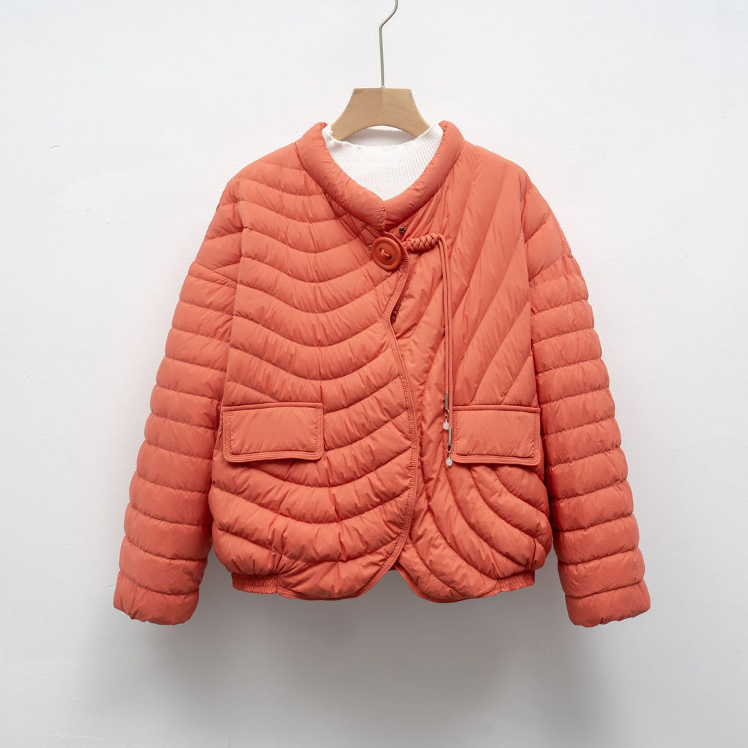 Trendy quilted jacket for women with asymmetrical cut and practical pockets Lune London