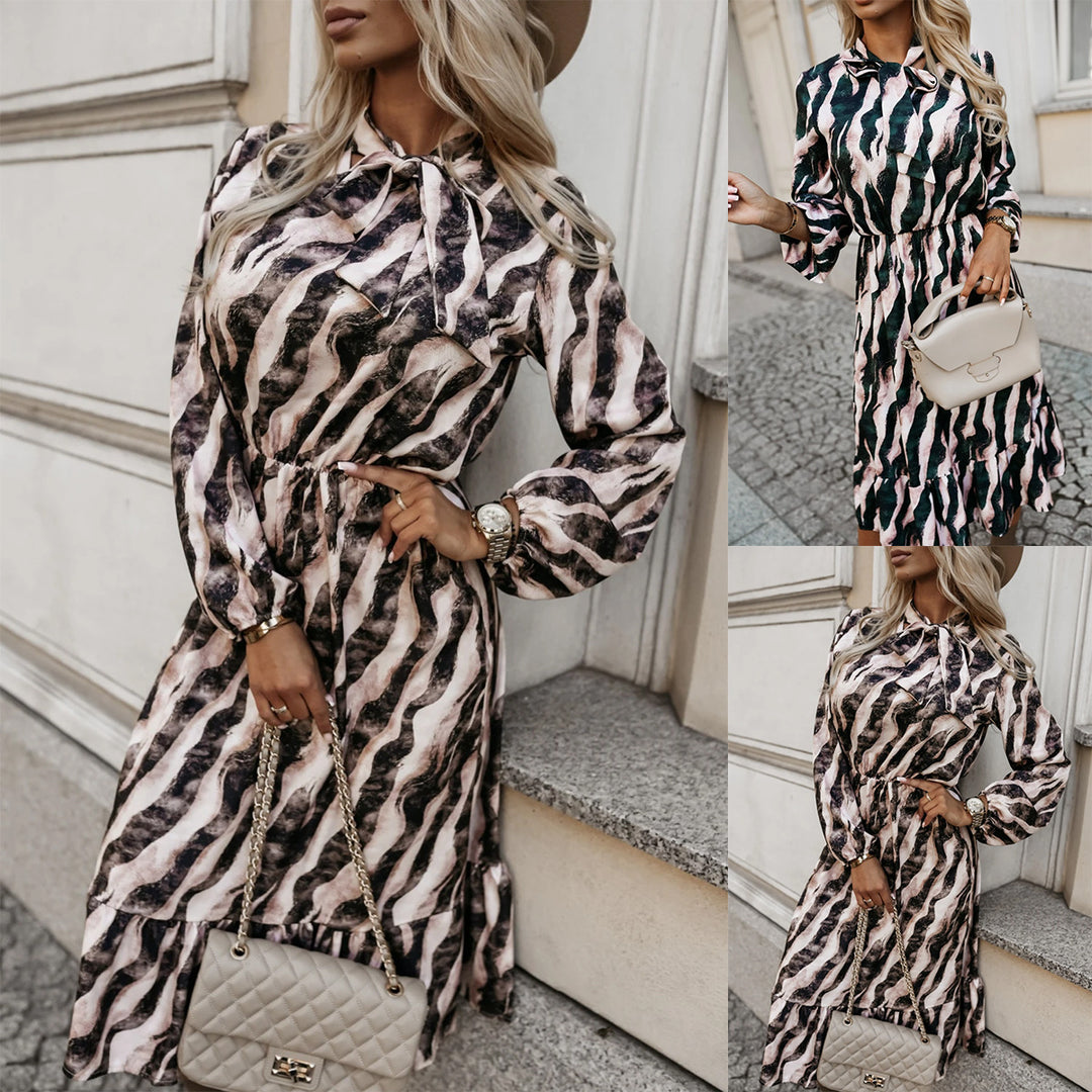 Boho striped midi dress for women with ruffles at the bottom Lune London