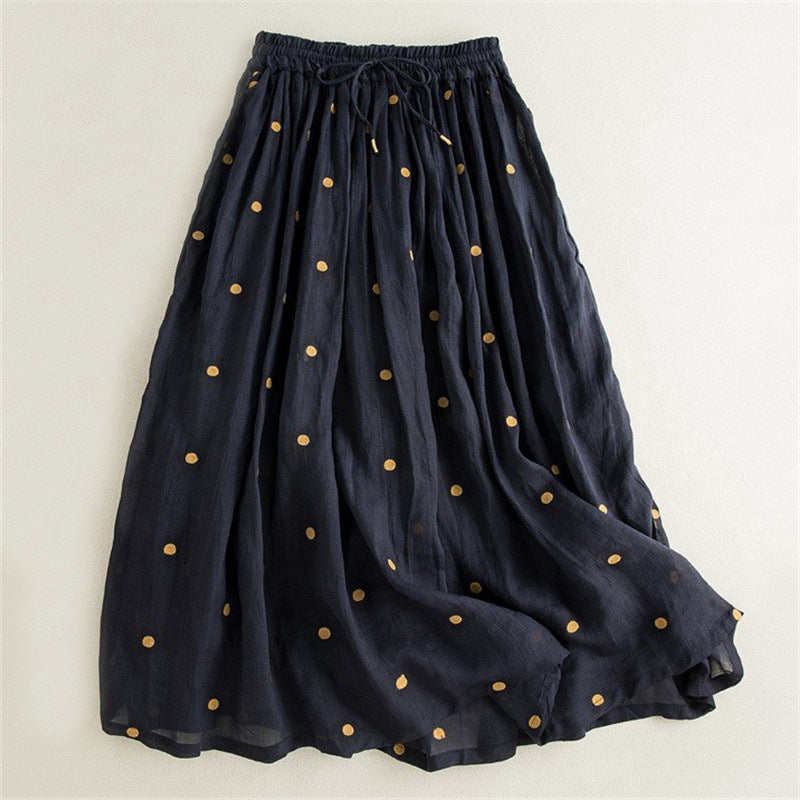 Ladies long and light skirt with elastic waistband and polka dot design Lune London