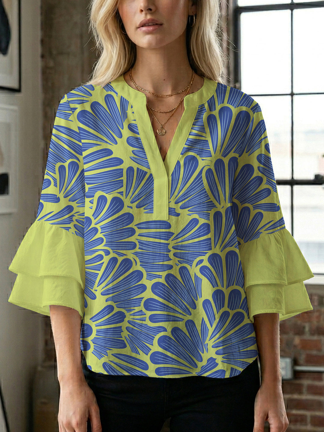 Ladies elegant blouse shirt with voluminous puff sleeves and graphic floral design Lune London