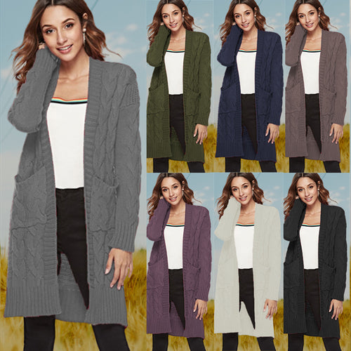 Chunky knit cardigan for women with an elegant cable design and practical pockets Lune London