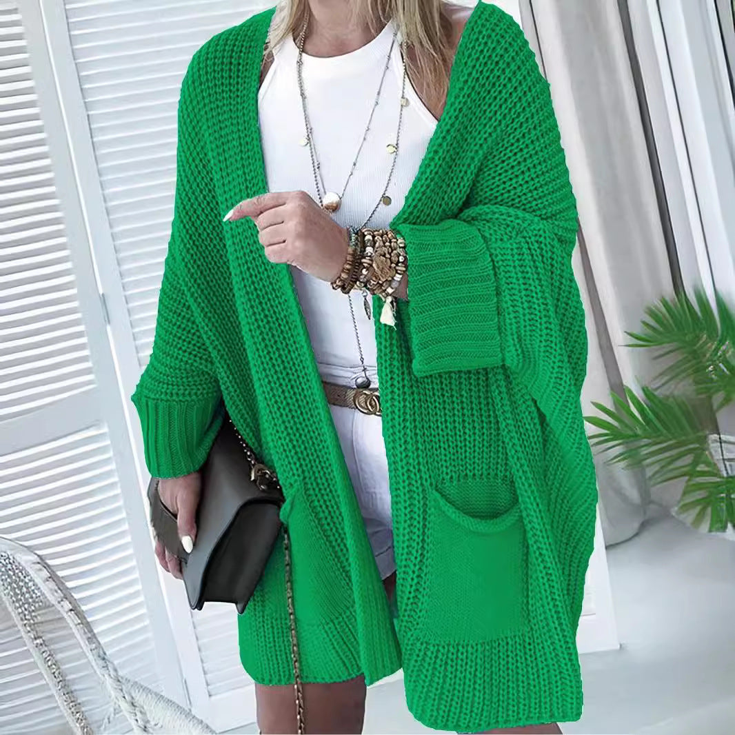 Thick knit vests for women with open sleeves and practical pockets