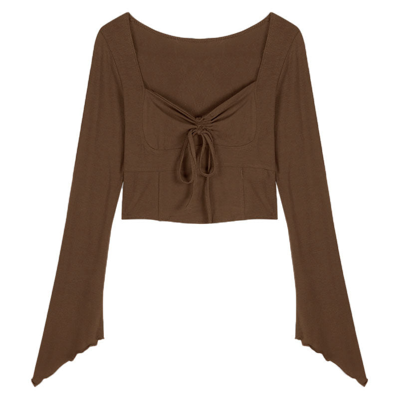 Women's crop top with a sophisticated knot and wide sleeve