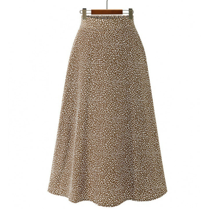 Jupe midi pour femmes avec une coupe élégante en A et un design à pois à la mode Chic & Stil