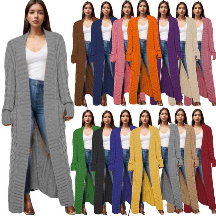 Women Thick knitted cardigan with a refined cable design and practical pockets Lune London