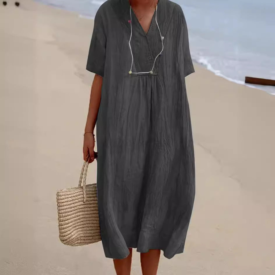 Casual beach dress for women with V-neck and wide hem Lune London